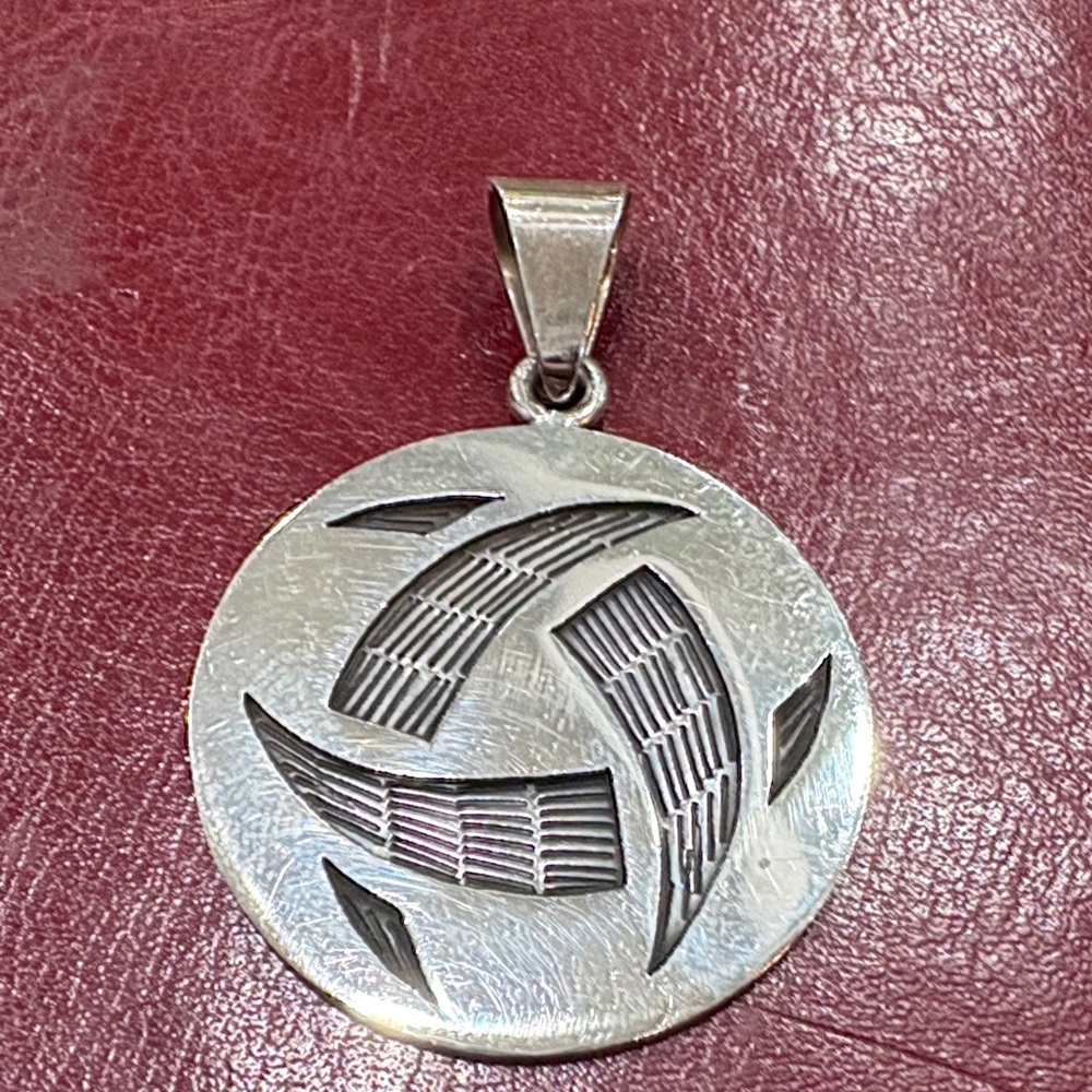 Elegant Silver Circular Pendant Necklace